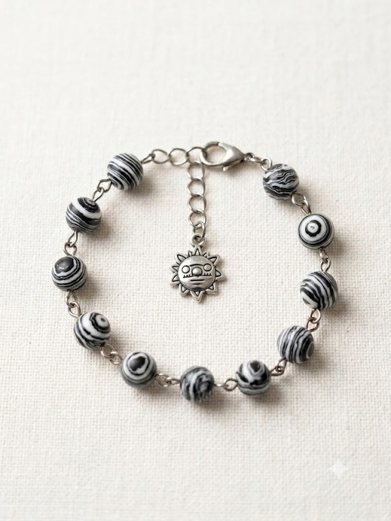 Black and White Zebra Malachite Bracelet with Stainless Steel Sun Charm