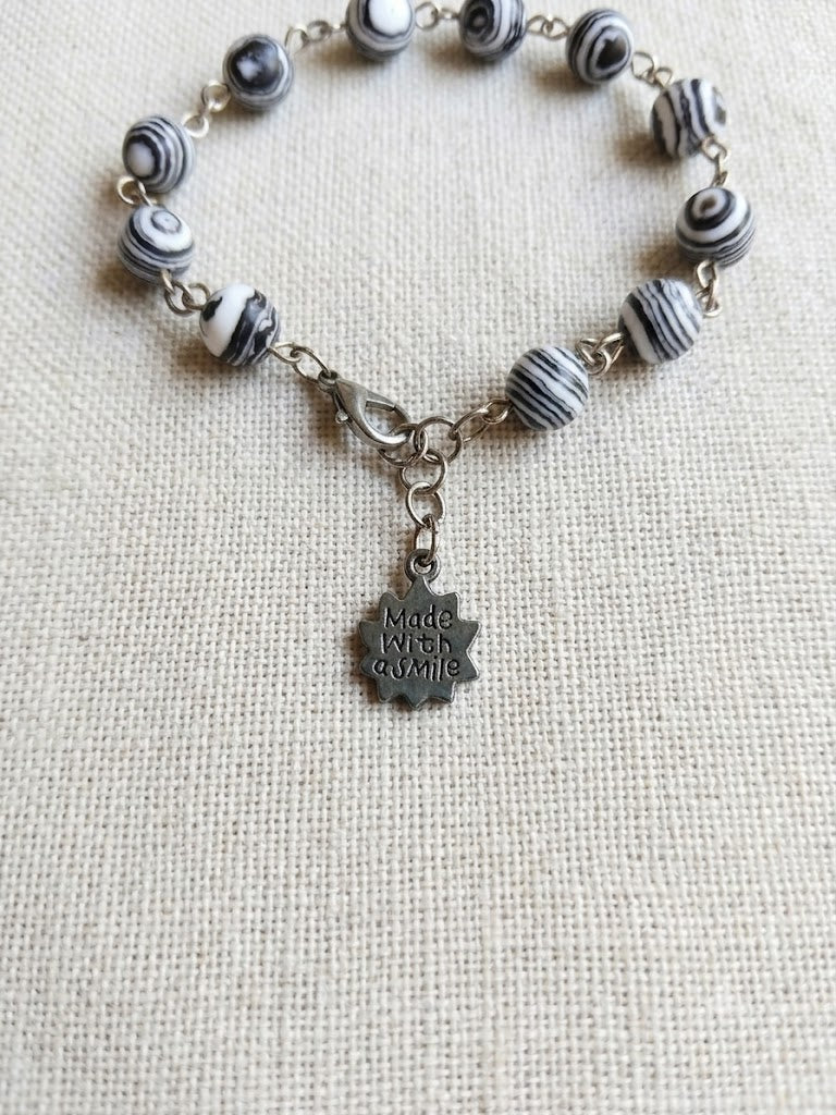 Black and White Zebra Malachite Bracelet with Stainless Steel Sun Charm
