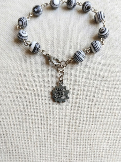 Black and White Zebra Malachite Bracelet with Stainless Steel Sun Charm