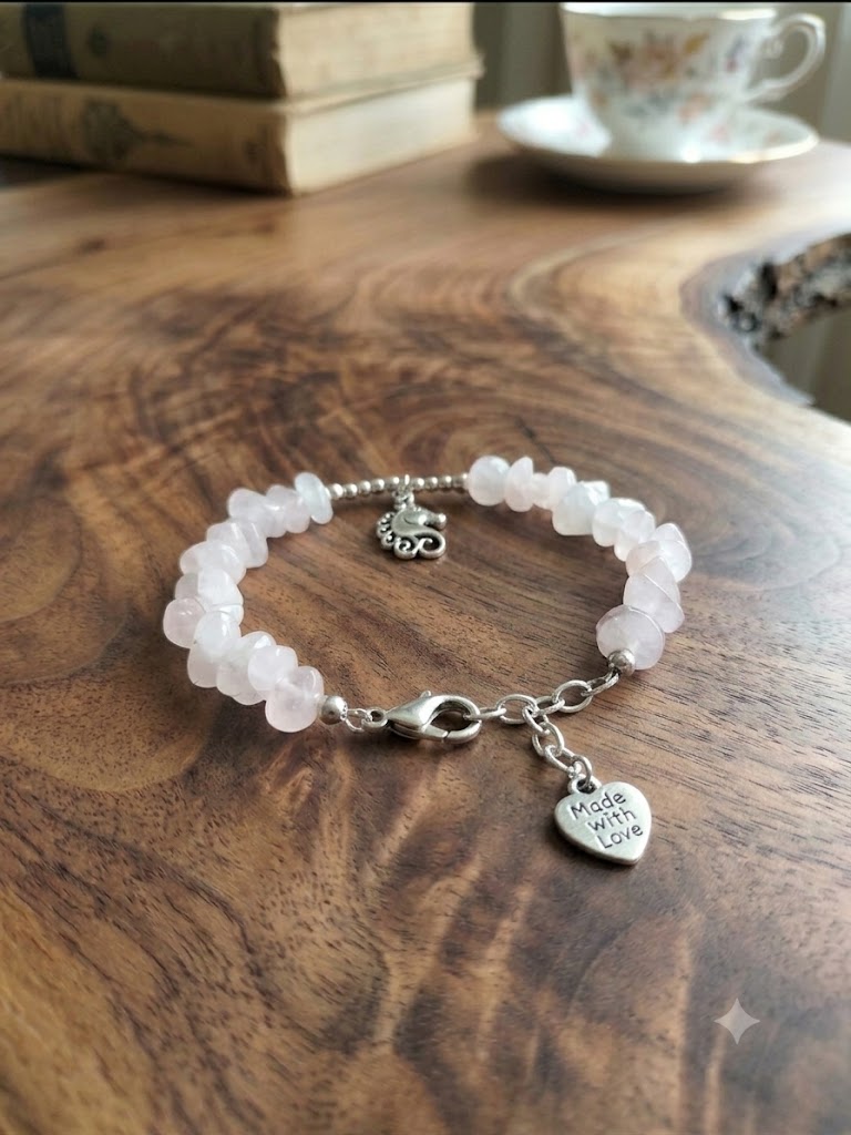 Embrace Magic and Compassion: Rose Quartz Chip Bracelet with Silver-Toned Unicorn and Heart Charms