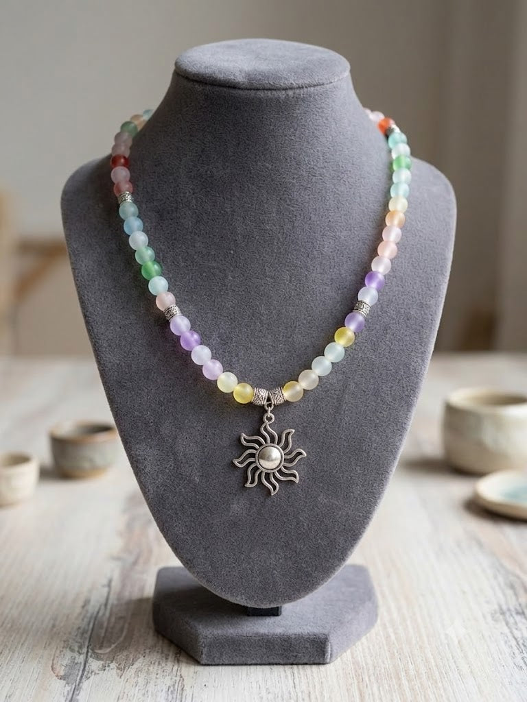 Embrace the Magic of the Sun: Pastel Rainbow Frosted Glass Necklace with Sun Pendant